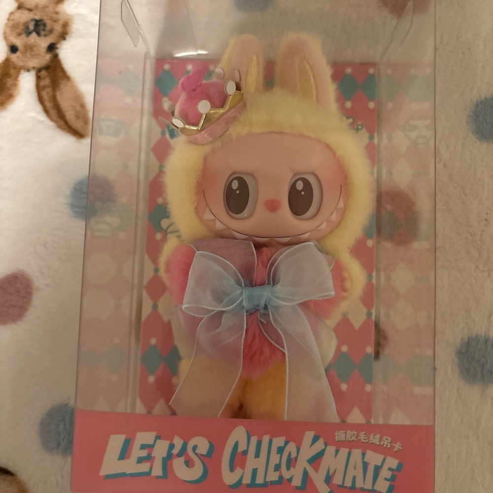 Colorful Bunny Figurine with Bow and Crown